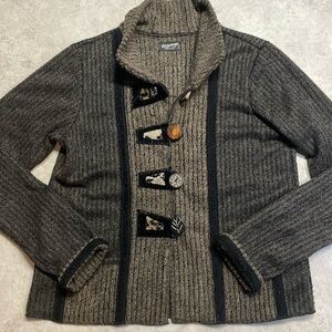 Lee Anderson woman’s cardigan style black/brown animal print accents. Size S.